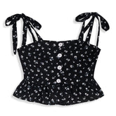 <img src="Black-White-Floral-Button-Front-Shoulder-Tie-Tank.jpg" alt="Black White Floral Button Front Shoulder Tie Tank" loading="lazy">